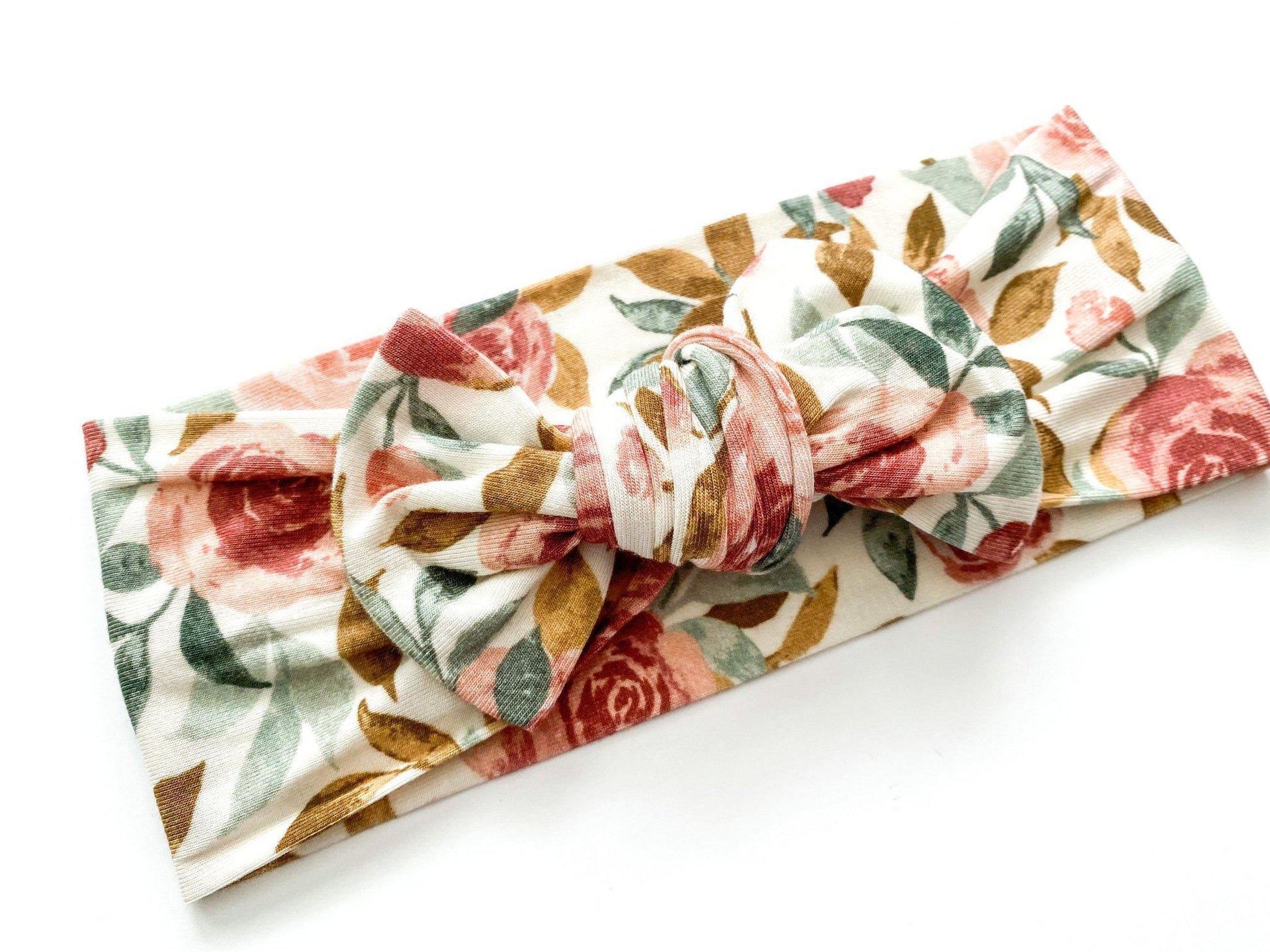Dusty pink floral bamboo knotted baby gown with fold-over cuffs