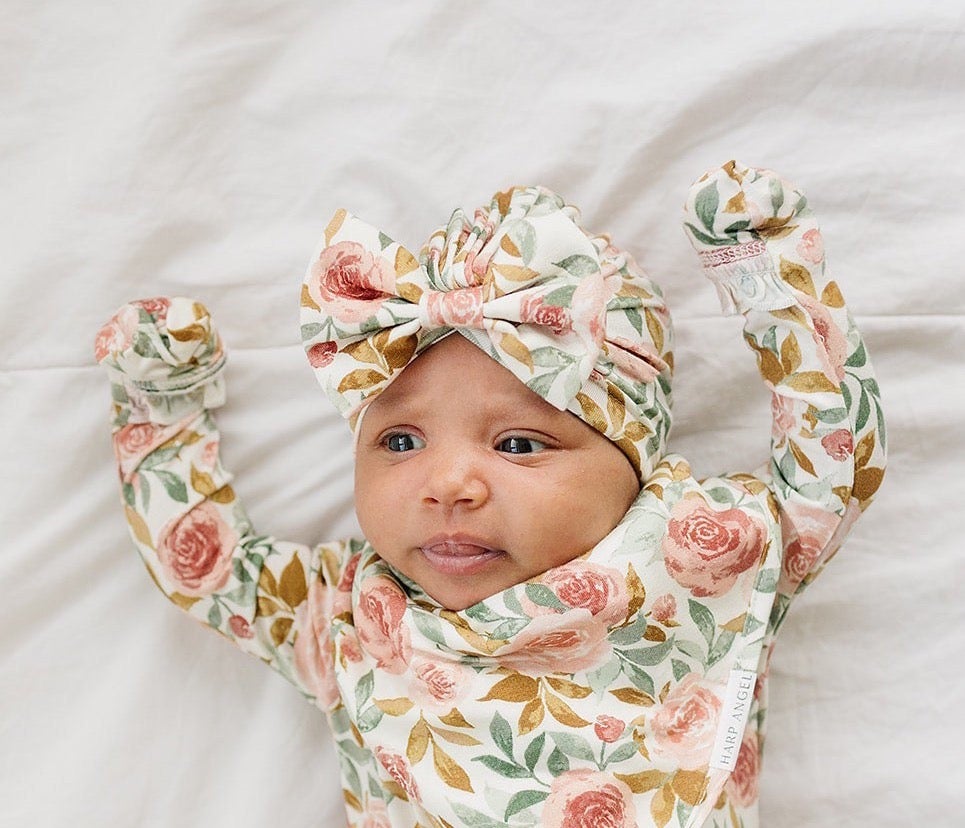 Dusty pink floral bamboo knotted baby gown with fold-over cuffs