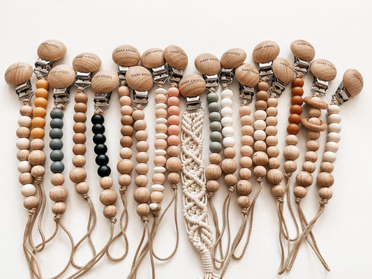 Wooden pacifier clip Harper with BPA-free silicone beads, 2-in-1 pacifier holder and teether, about 8 inches long.